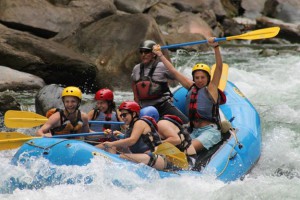 Rafters on white water section of river