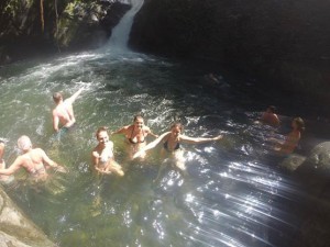 Students swimming at base of waterfall near to Boquete