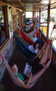 Students studyng in hammocks