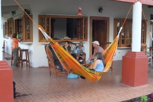 Front of school with students in hammocks