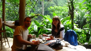 Couple having breakfast in Pacuare River jungle setting