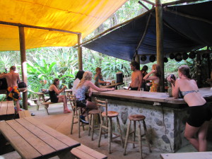 Group in rustic camp in jungle