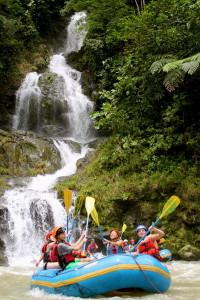 River rafting with beautiful cascading waterfall