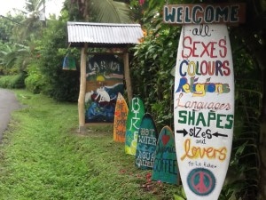 Entrance of hostel with surf boards as signs