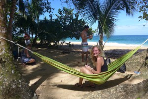Student in hammock in Bluff Beach