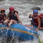 Students having fun rafting in Turrialba