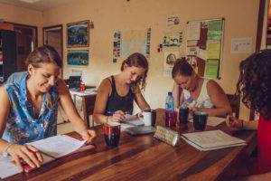 Four girls studying at a table